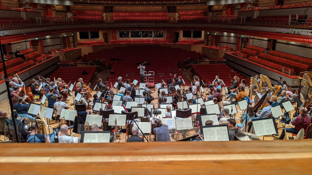 Mr Ashfield with the Halle Choir at the Birmingham Symphony Hall